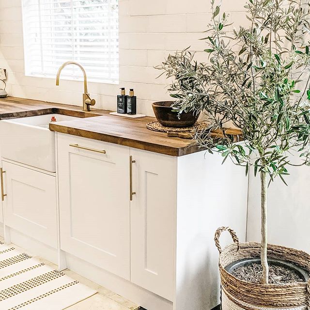 Update your kitchen cabinets with gold hardware