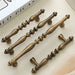 Vintage Solid Brass Spindle Cabinet Handles