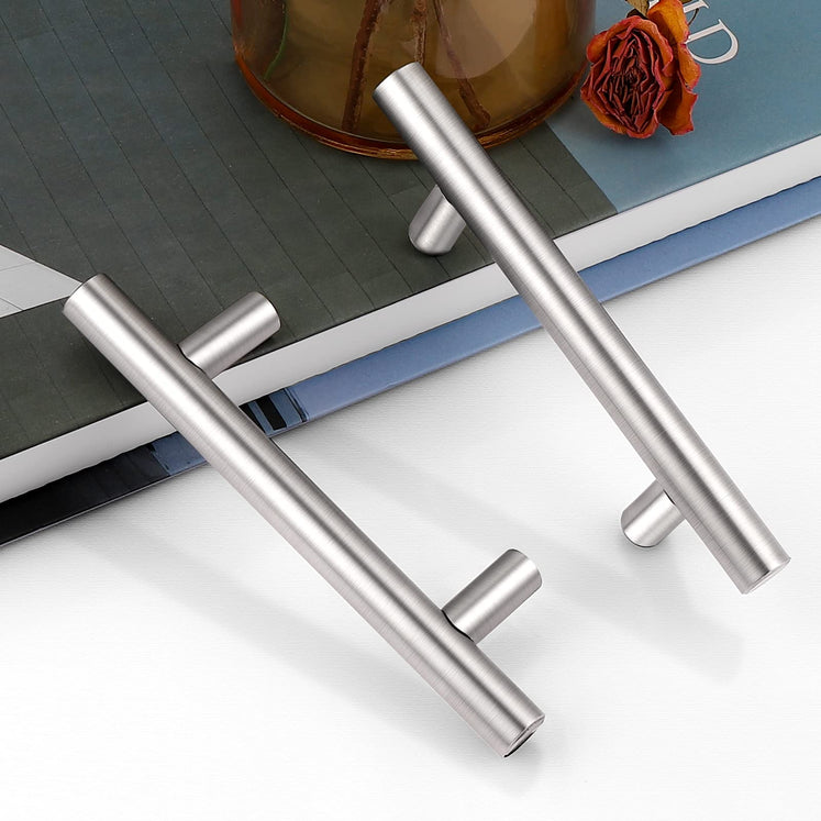 Timeless Brushed Nickel hardware on transitional grey cabinets